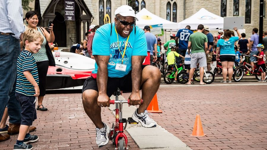 man on a tiny bike