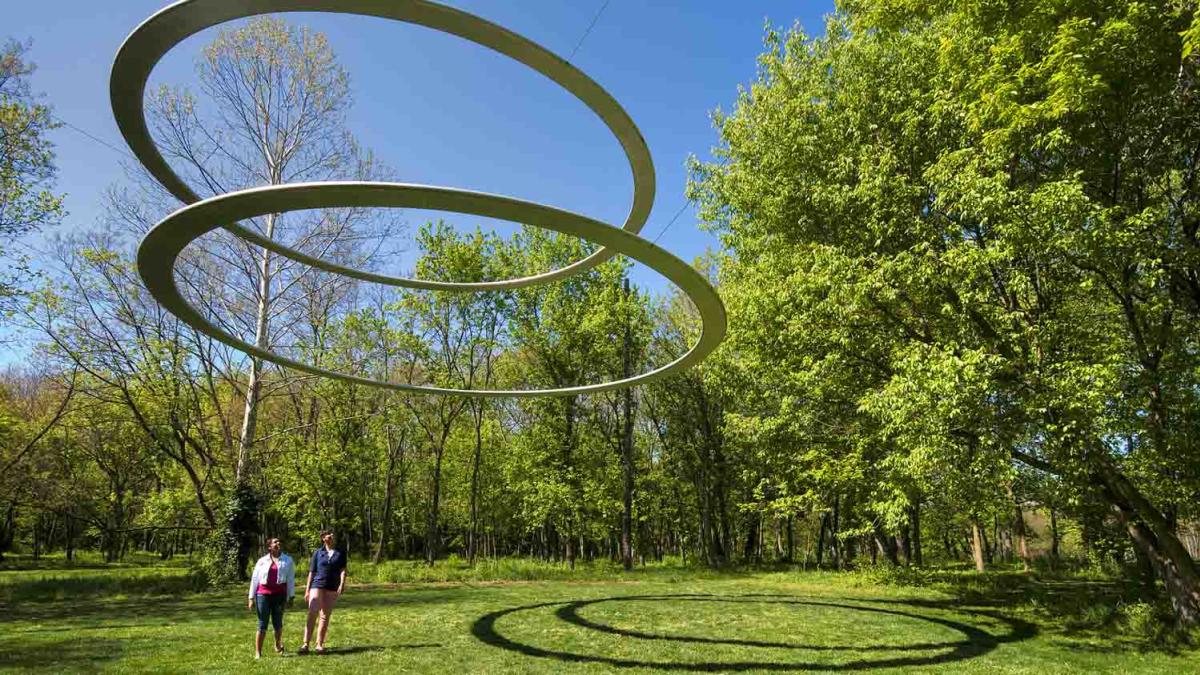 Two people looking at a sculpture at the Indianapolis Museum Of Art