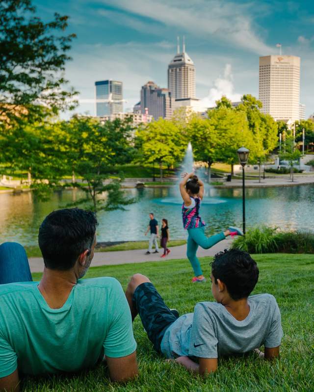 Families enjoying the banks of the Central Canal